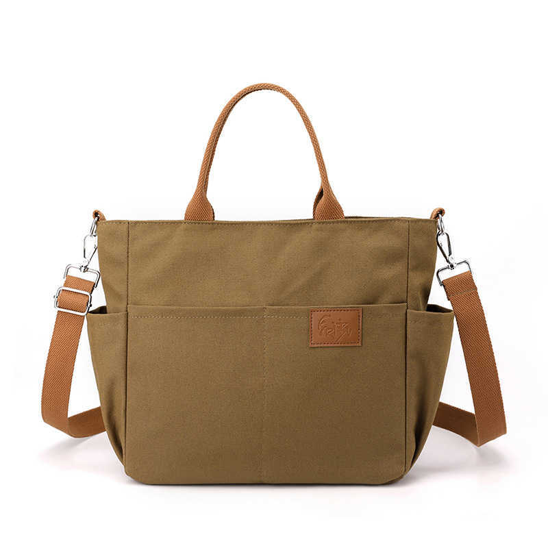 shoulder bag women's bag trend versatile, simple fashionable Korean version large capacity handheld college sail cloth bag 241215