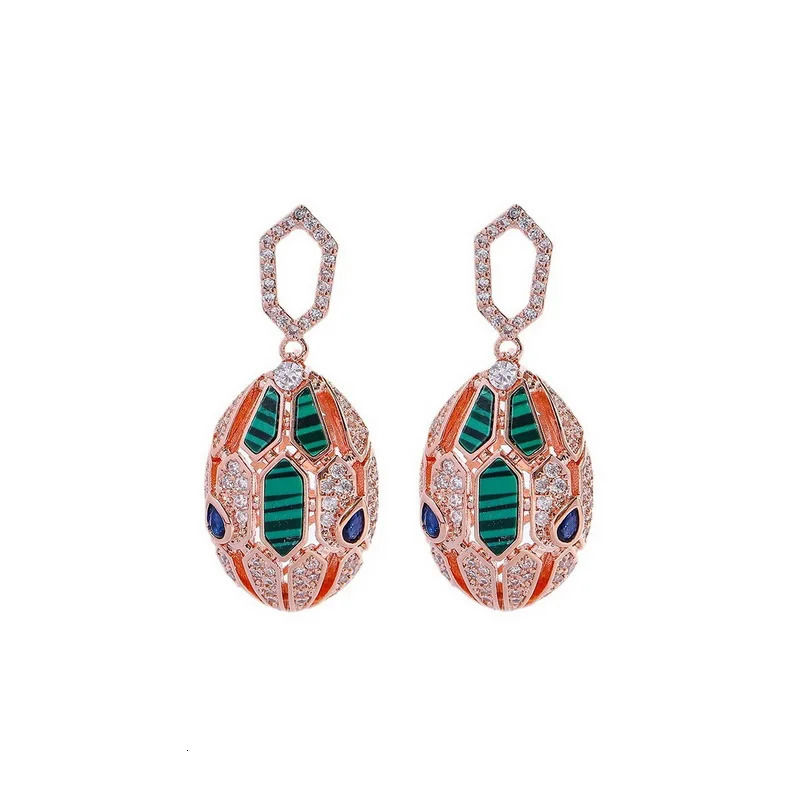 European and American er earrings for women set with cubic zirconia peacock stone gold-plated 925 silver needle snake earrings 241209