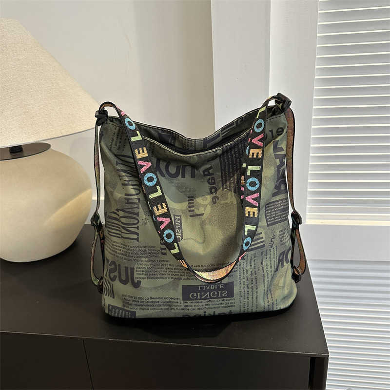 Printed trendy backpack with one shoulder two backpacks Korean version simple casual versatile armpit bag letter bag 241215