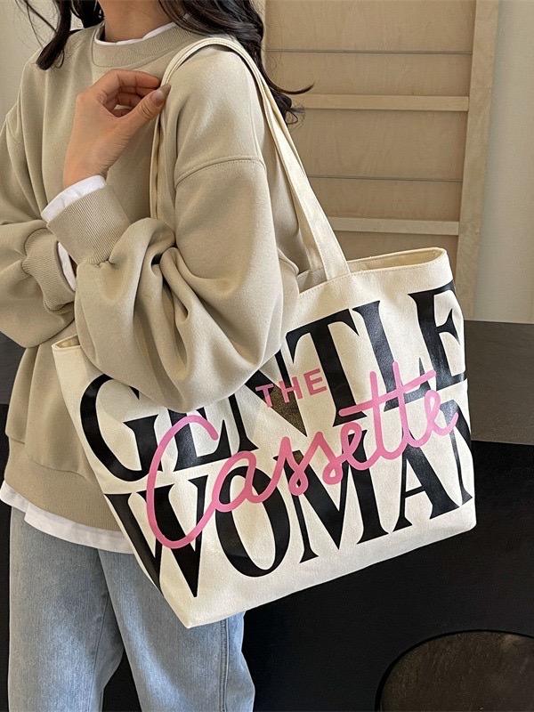 Thai niche canvas for women 2024 new fashionable large capacity letter shoulder class tote bag