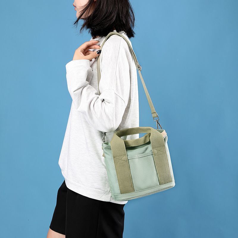 New Women s Small Zipper Fashion Designer Women s One Shoulder Portable Thick Canvas Phone Bucket Handbag Trendy Bag bag
