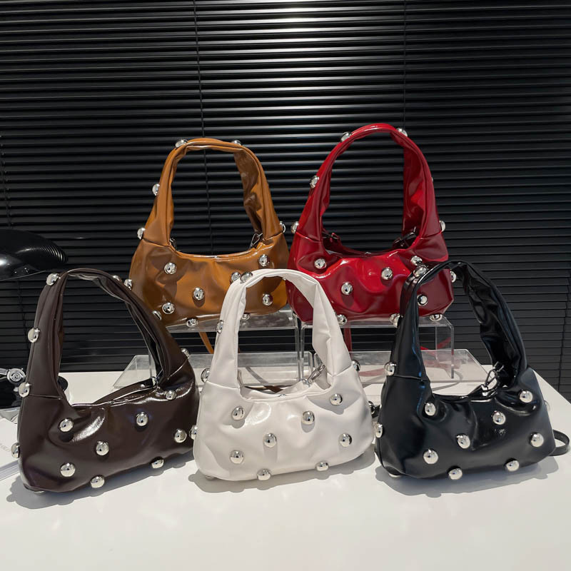 2025 new Fashionable and versatile rivet handbag for women new simple underarm bag, popular single shoulder commuting bag