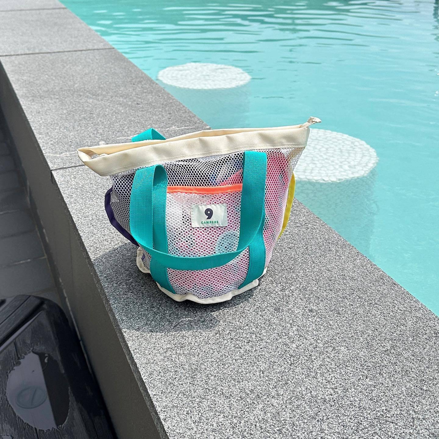 2025 new Korean ins beach outdoor travel mesh storage bag, swimming, bathing, washing, hand-held small bag zhanyishengli