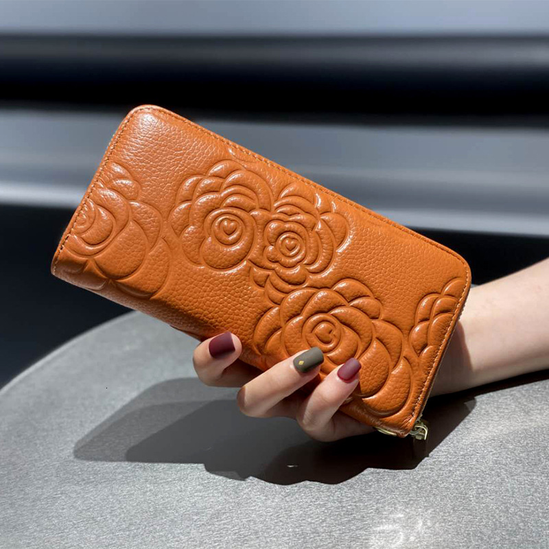 Head layer cowhide handbag wallet, new style grab genuine leather, women's bag, embossed wrist bag