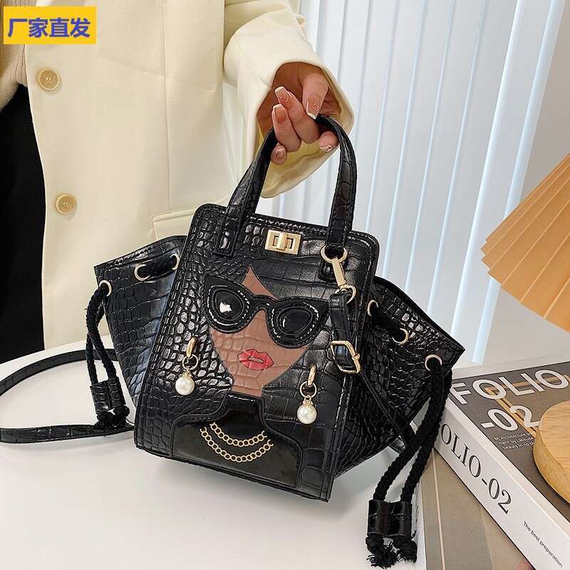 Stone patterned niche crossbody women's cartoon girl glasses handbag, fashionable shoulder bag, 2024 new casual versatile fashion clothing