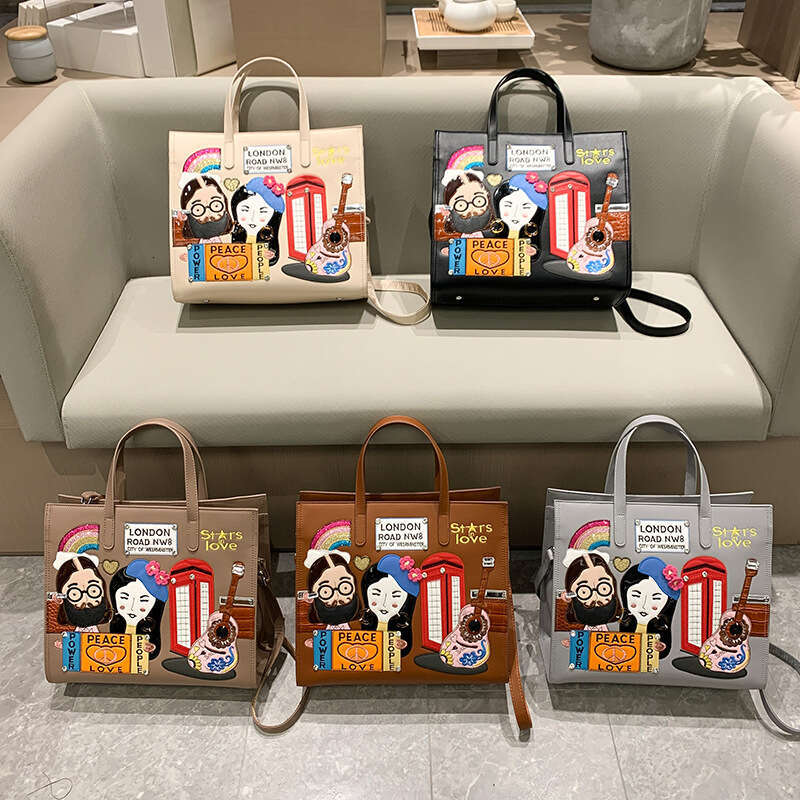 Small niche design women's embroidered fabric commuting handbag, one shoulder crossbody tote bag, 2024 new style, chic and elegant clothing