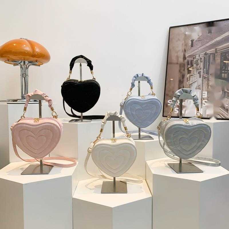 Love bag for women new hard shell heart shaped candy colored shoulder bag Fashion diagonal cross bag couple womens handbag