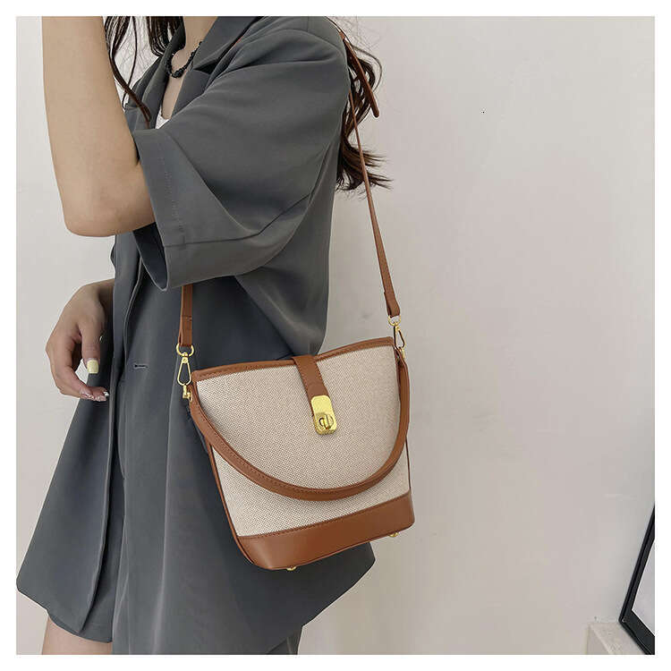 Wholesale Canvas Contrasting Splicing Hand-Held Bucket Women's Cross-Border New Single Shoulder Crossbody Bag, Fashionable Quality, Classic