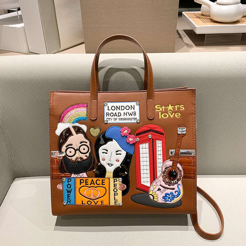 Small niche design women's embroidered fabric commuting handbag, one shoulder crossbody tote bag, 2024 new style, chic and elegant clothing