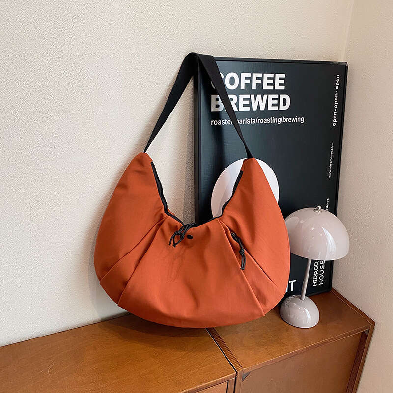 Korean version niche design nylon armpit commuting bag for women, outdoor functional style shoulder bag, 2024 new casual fashion trend clothing