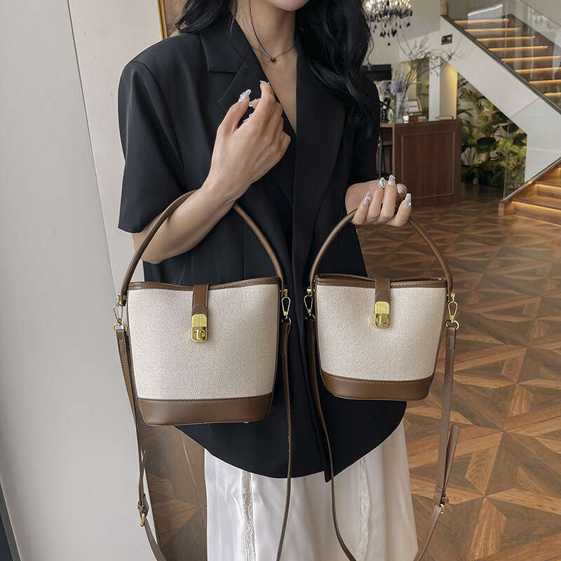 Wholesale Canvas Contrasting Splicing Hand-Held Bucket Women's Cross-Border New Single Shoulder Crossbody Bag, Fashionable Quality, Classic