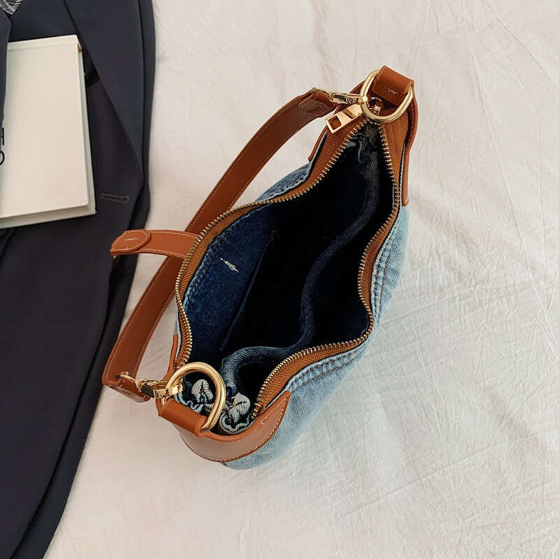 Advanced denim commuting women's style armpit dumpling French texture cow horn crescent bag, 2024 new casual fashion trend clothing