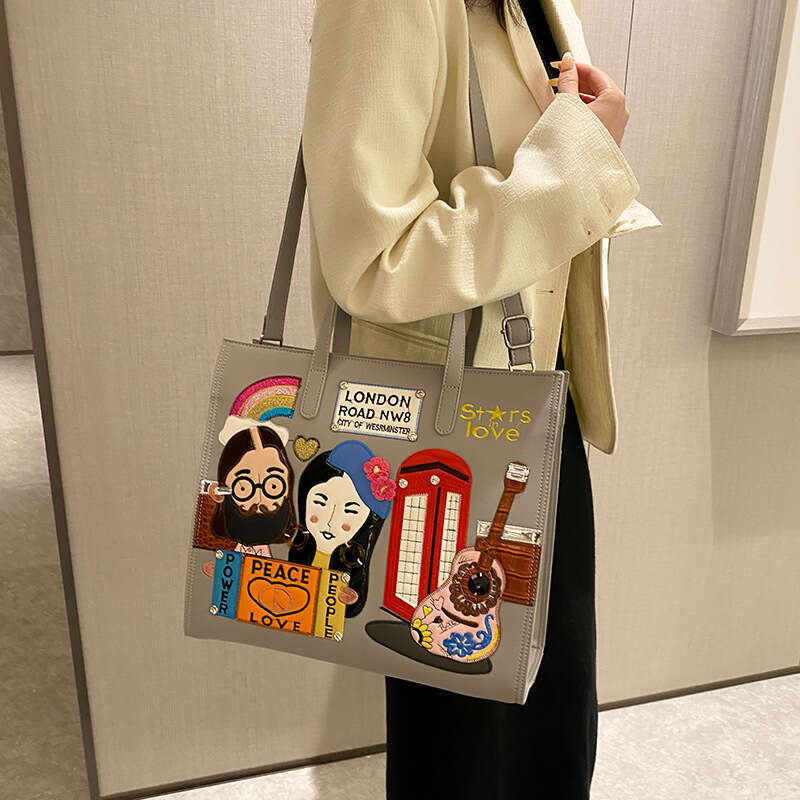 Small niche design women's embroidered fabric commuting handbag, one shoulder crossbody tote bag, 2024 new style, chic and elegant clothing