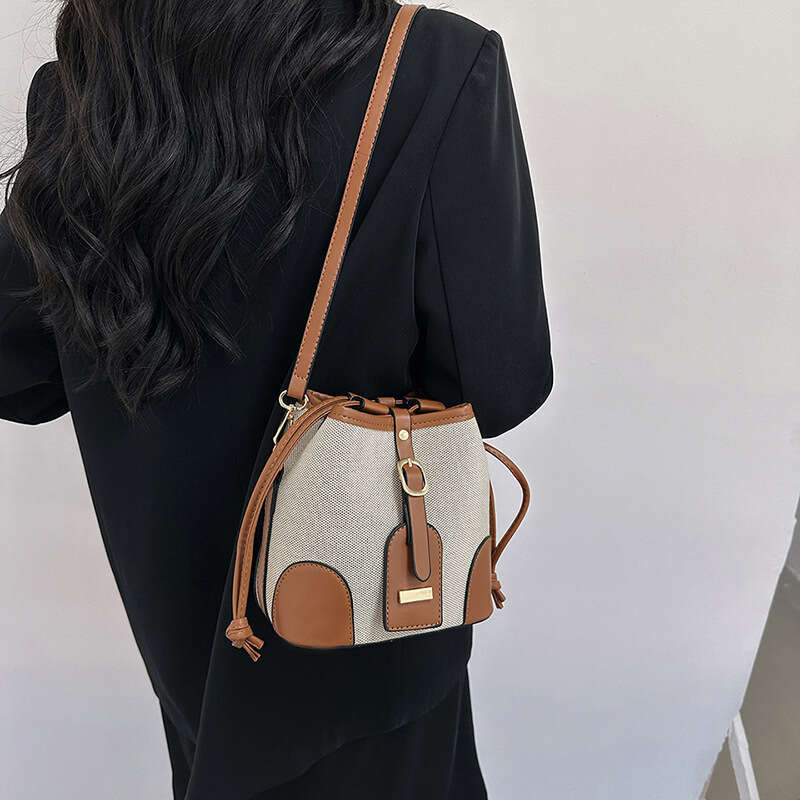 Wholesale Hand-Held Water Bucket Bags, Women's New Style Canvas Contrasting Color Drawstring, High-End Single Shoulder Crossbody Bag, Fashionable