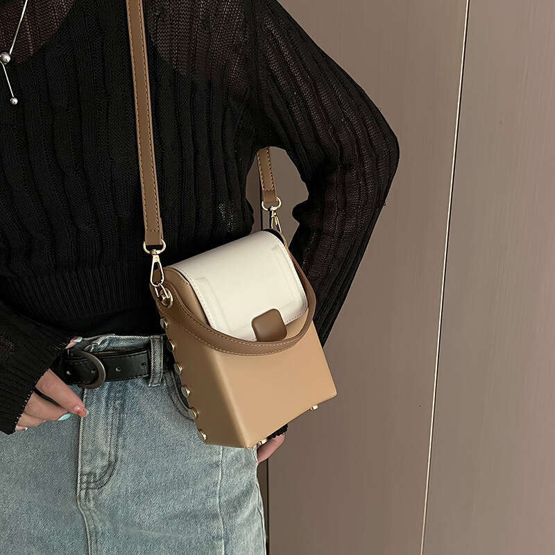 Niche Rivet Contrasting Bag For Women's Spring, New Korean Version, Hand-Held Small Square Vertical Style, Western-Style Single Shoulder Crossbod