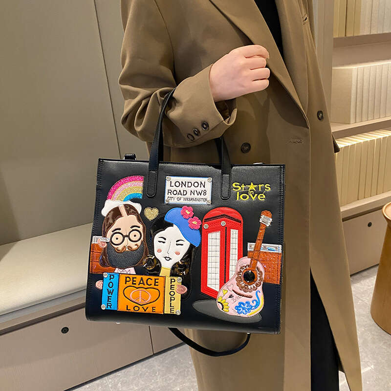 Small niche design women's embroidered fabric commuting handbag, one shoulder crossbody tote bag, 2024 new style, chic and elegant clothing