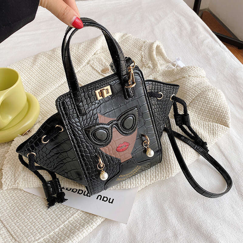 Stone patterned niche crossbody women's cartoon girl glasses handbag, fashionable shoulder bag, 2024 new casual versatile fashion clothing