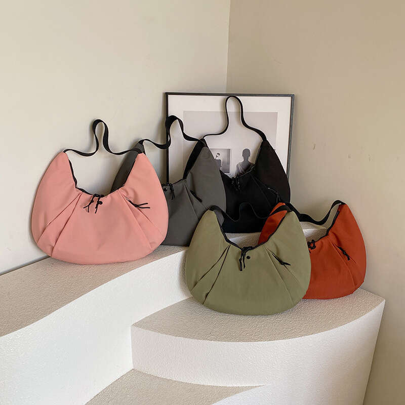Korean version niche design nylon armpit commuting bag for women, outdoor functional style shoulder bag, 2024 new casual fashion trend clothing