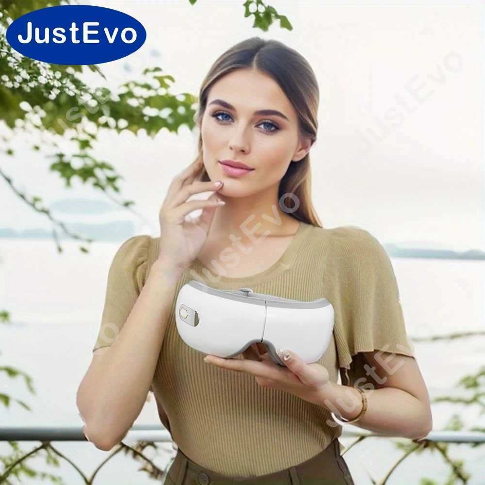JustEvo eye massager eye care device with vibration massage heating function and music function. E-10B W241213