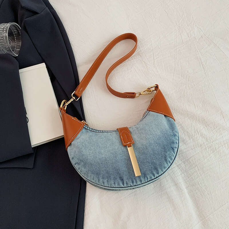 Advanced denim commuting women's style armpit dumpling French texture cow horn crescent bag, 2024 new casual fashion trend clothing