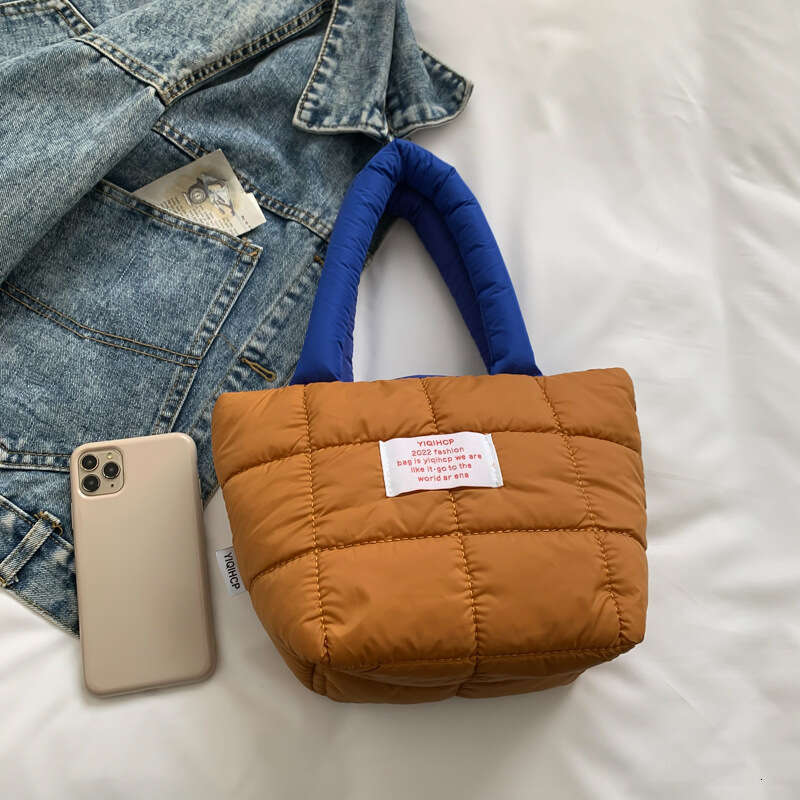Internet celebrity hot autumn and winter space cotton bag, women's style fresh candy color handle bucket bag wholesale 2024 new casual fashion tr