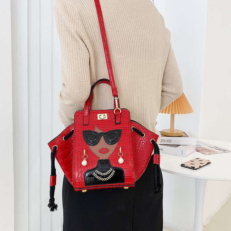 Stone patterned niche crossbody women's cartoon girl glasses handbag, fashionable shoulder bag, 2024 new casual versatile fashion clothing