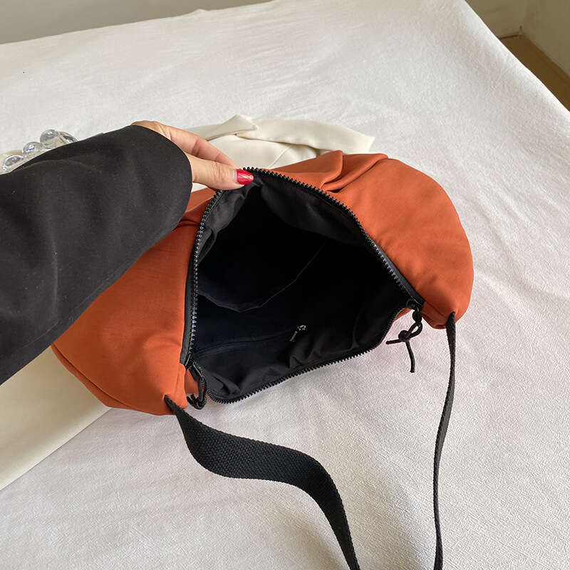 Korean version niche design nylon armpit commuting bag for women, outdoor functional style shoulder bag, 2024 new casual fashion trend clothing