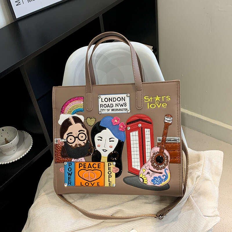 Small niche design women's embroidered fabric commuting handbag, one shoulder crossbody tote bag, 2024 new style, chic and elegant clothing
