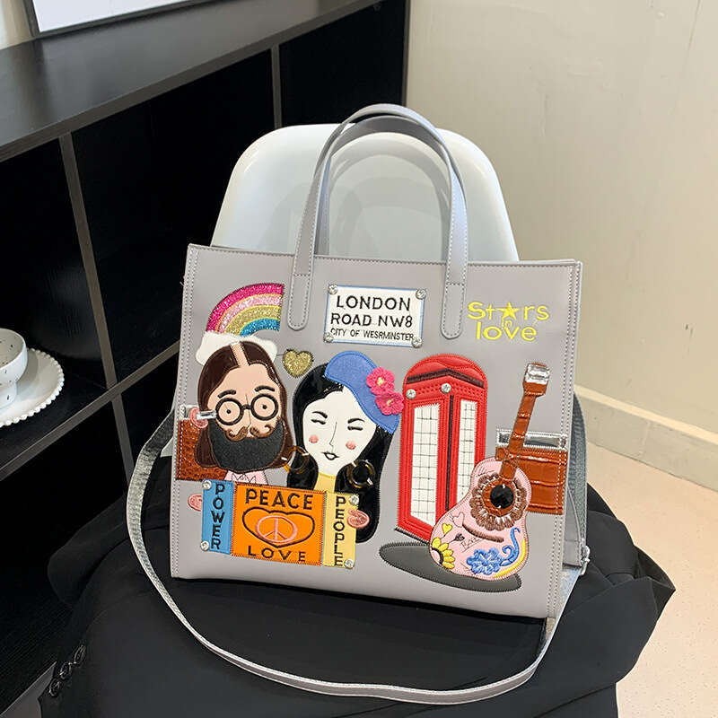 Small niche design women's embroidered fabric commuting handbag, one shoulder crossbody tote bag, 2024 new style, chic and elegant clothing