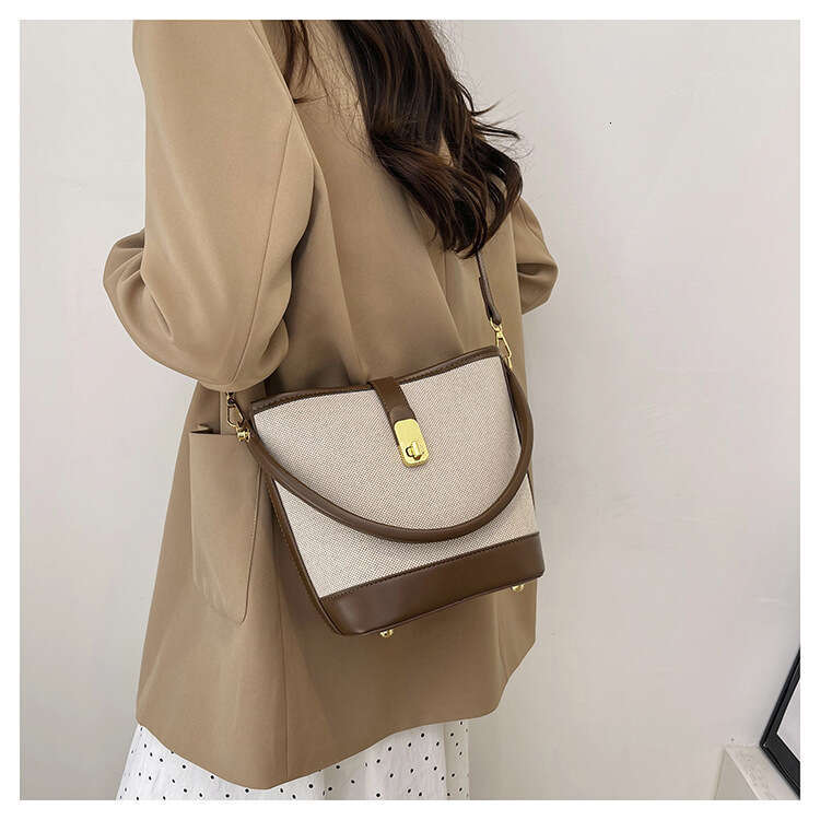 Wholesale Canvas Contrasting Splicing Hand-Held Bucket Women's Cross-Border New Single Shoulder Crossbody Bag, Fashionable Quality, Classic