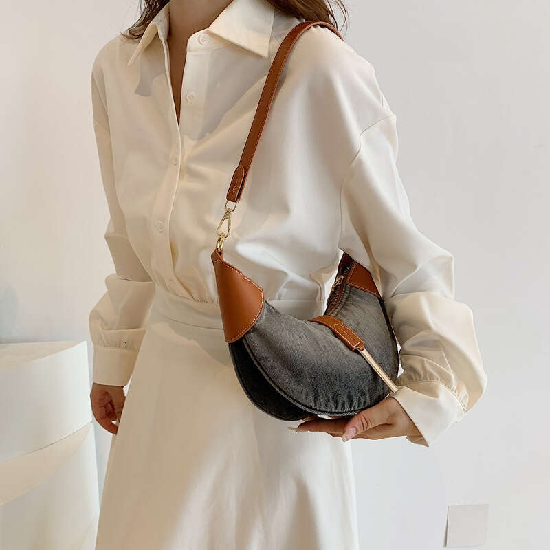Advanced denim commuting women's style armpit dumpling French texture cow horn crescent bag, 2024 new casual fashion trend clothing