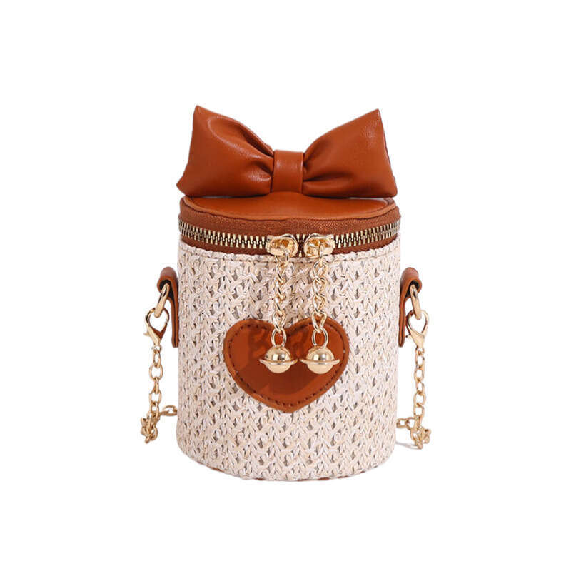2025 New Bohemian Mini Splicing Straw Water Bucket Women's Crossbody Woven Chain Bow Bag