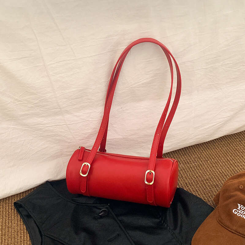 2025 fashion new Korean version ins handheld cylindrical niche trend single shoulder bag, women's commuting simple armpit bag