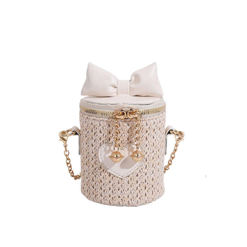 2025 New Bohemian Mini Splicing Straw Water Bucket Women's Crossbody Woven Chain Bow Bag