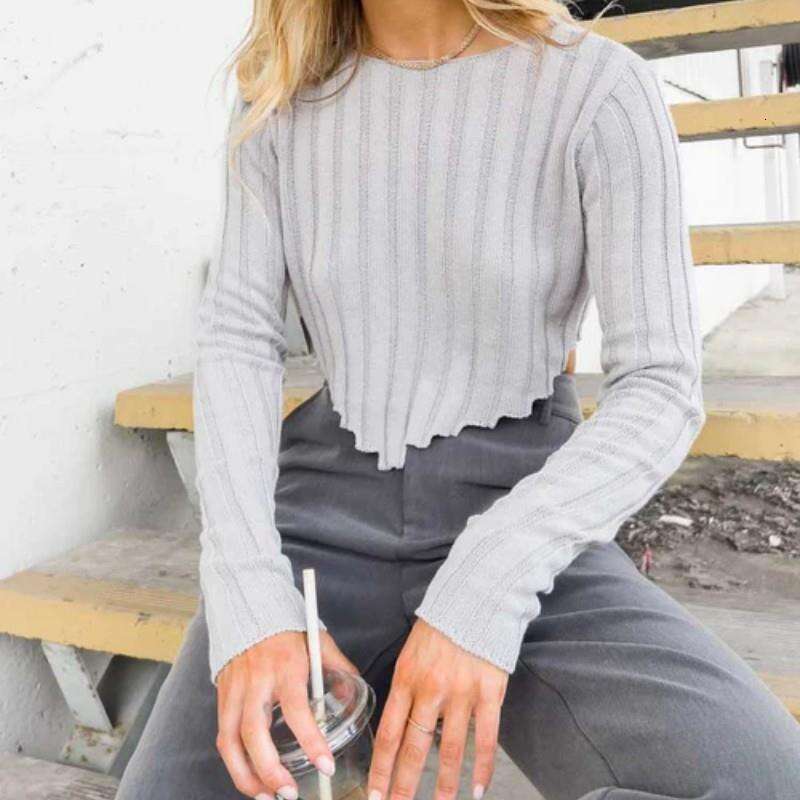 European American autumn and winter women's clothing solid color pit stripe long sleeved short style exposed navel knitted sweater top for women