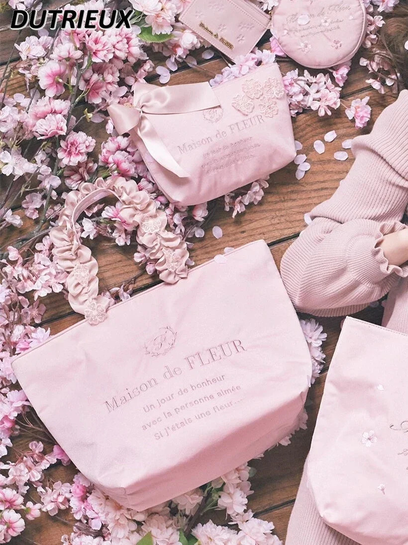 Womens handbag Japanese style spring and summer hand-held dumplings bow satin womens makeup bag cute makeup bag 241212