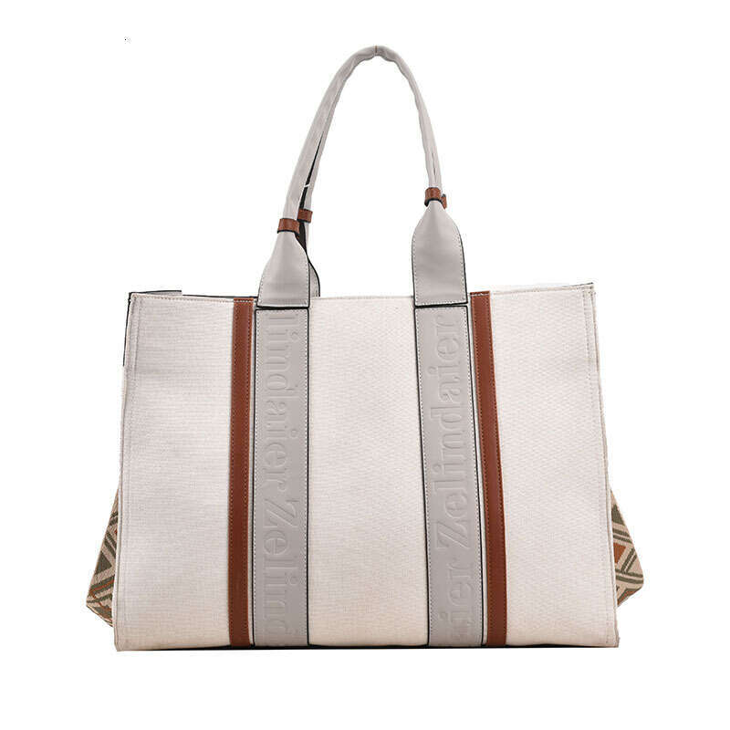 Female High-End Niche Tote Bag, New Color Blocking Handbag, Large Capacity Commuting Crossbody Bag