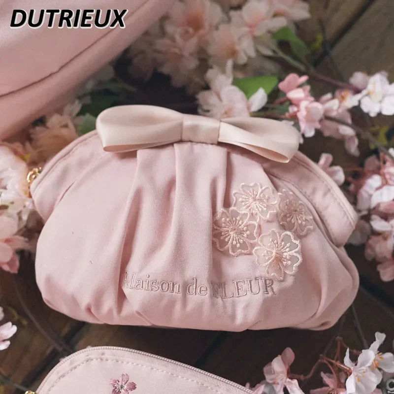 Womens handbag Japanese style spring and summer hand-held dumplings bow satin womens makeup bag cute makeup bag 241212