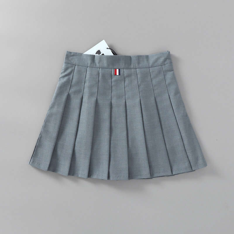 College age reducing high slimming back waist woven pleated women's summer anti slip A-e short skirt 2024 new style chic and elegant clothing