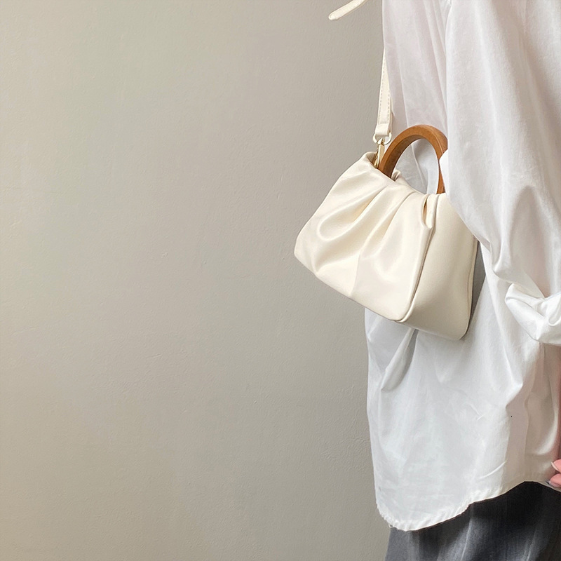 New Designer Wooden Handle Pleated Cloud Bag Hand-held Women's Bag Shoulder Bag Slanted Mini Bag