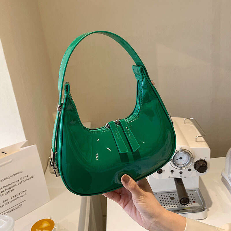 Women's 2023 Spring/Summer New Simple and Fashionable Lacquer Skin Shining Face Single Shoulder Underarm Bag Western Moon