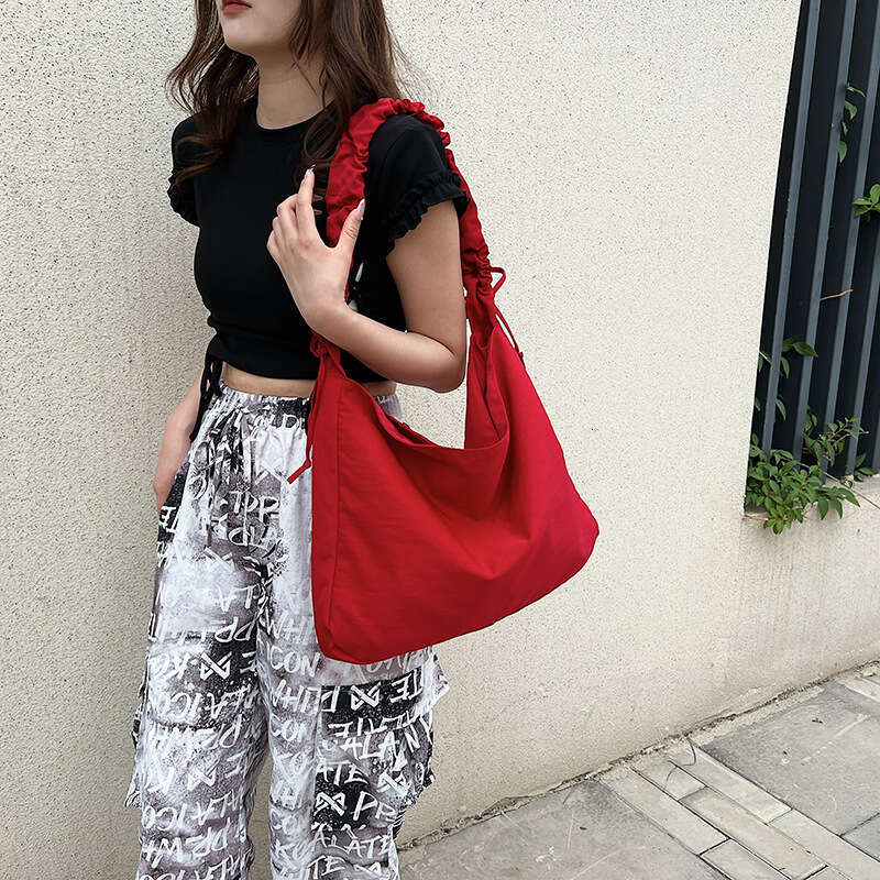 Korean version simple capacity class commuting niche nylon single shoulder crossbody large bag for women 2024 new casual versatile fashion clothing