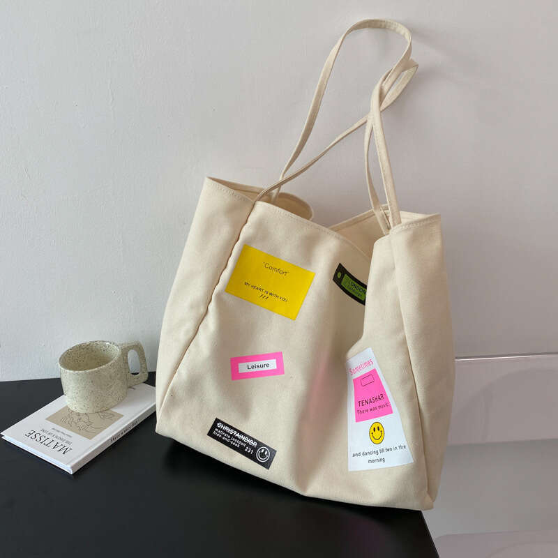Japanese and Korean large capacity canvas commuting shoulder for women, 23 styles, niche Instagram style adhesive fabric armpit tote bag wholesale, 20