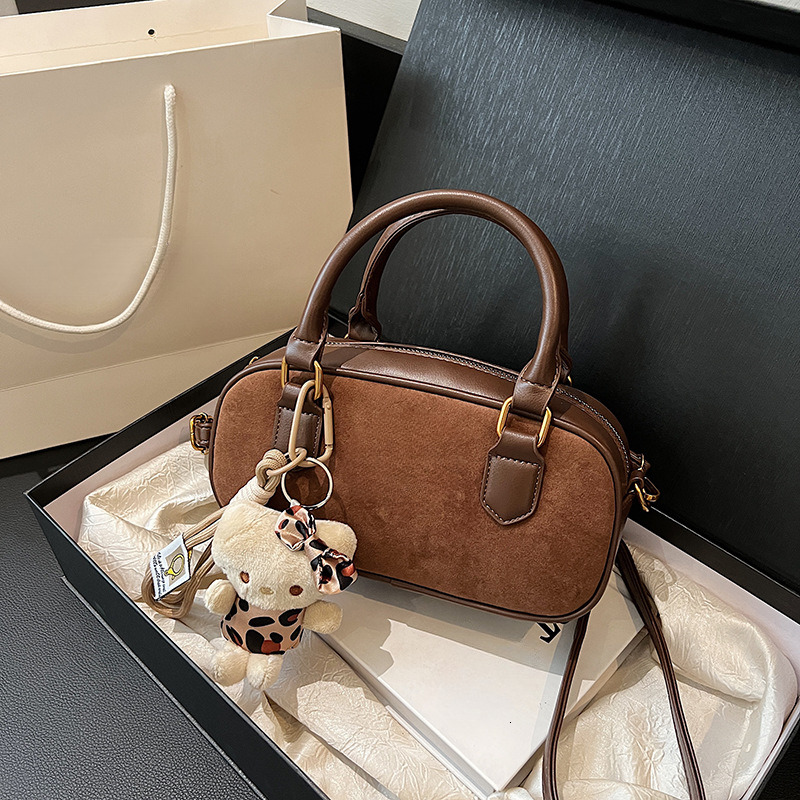 New Designer Retro Multifunctional Outdoor Handbag Horizontal Bag Bowling Bag mmbag