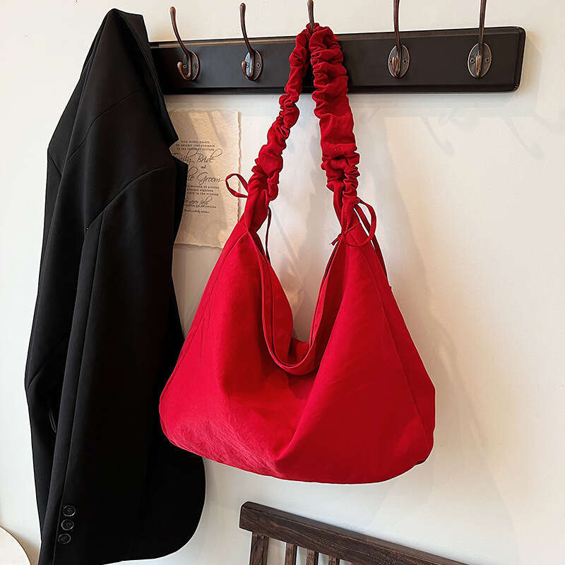 Korean version simple capacity class commuting niche nylon single shoulder crossbody large bag for women 2024 new casual versatile fashion clothing