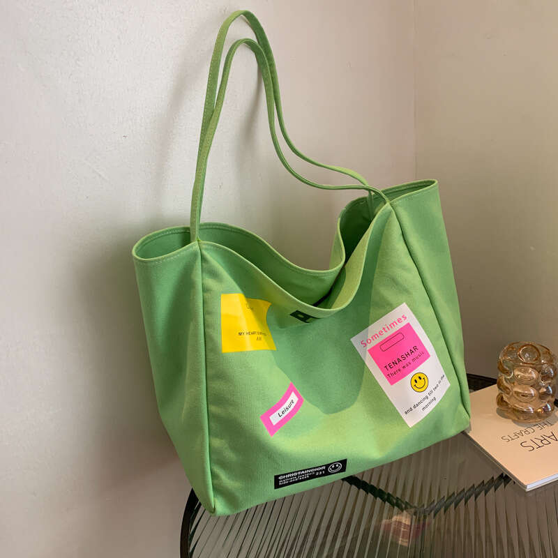 Japanese and Korean large capacity canvas commuting shoulder for women, 23 styles, niche Instagram style adhesive fabric armpit tote bag wholesale, 20