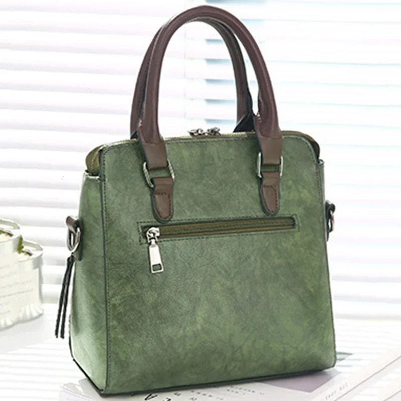Retro womens PU leather handbag womens messenger bag Tassel er cross body shoulder bag Boston handbag 241212