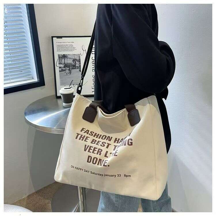 Canvas for women 2024 new letter tote Korean version fashionable versatile crossbody shoulder bag student backpack