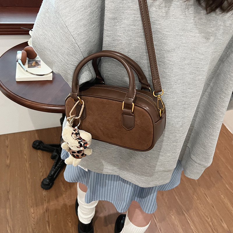 New Designer Retro Multifunctional Outdoor Handbag Horizontal Bag Bowling Bag mmbag