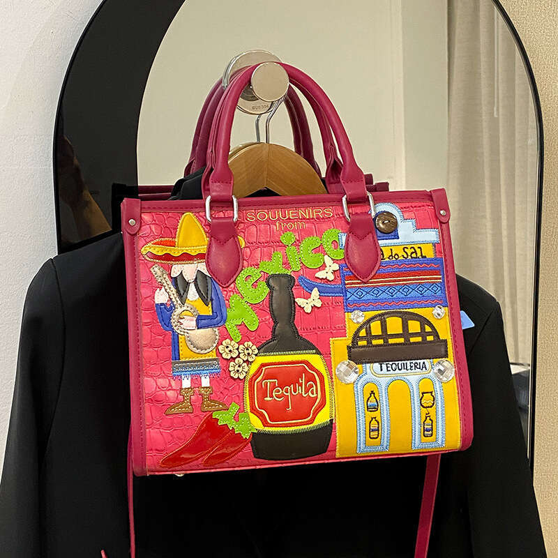 Large capacity handbag with female niche design, Mexican style adhesive fabric embroidery graffiti single shoulder crossbody bag, 2024 new casual vers
